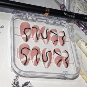 Milky pink press on nails with black and white line art design – elegant reusable nails by Glow Nails