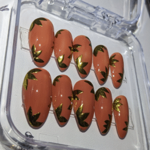 Peach press on nails with golden chrome shine – elegant reusable nails by Glow Nails